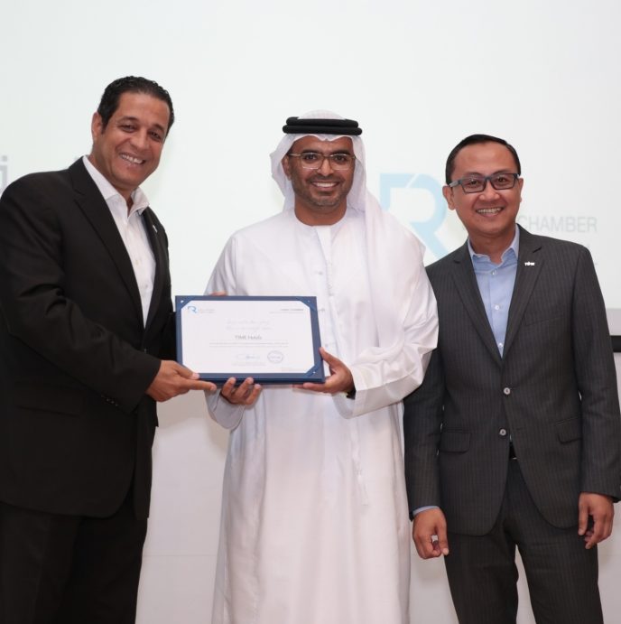 Mohamed Awadalla, CEO, TIME Hotels receives the CSR Label award from Majid Saif Al Ghurair, chairman of Dubai Chamber, alongside Eddie Ignatius, corporate director of innovation and quality, Time Hotels.