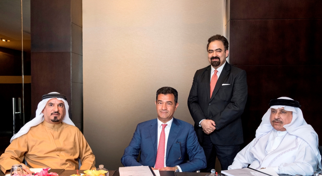 Left to Right: Bader Bukhamas, chairman of Khamas Group;  Sami Nasser, chief operating officer, Luxury Brands, AccorHotels Middle East; Mohammed Yousuf Abdulkarim Bukhamas, Khamas Group Standing: Pawan Kachroo , managing director of Khamas Group